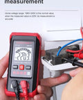 Person measuring AC voltage with Auto Ranging Digital Multimeter With Non Contact Voltage Tester Smart Measurement And Electrical Voltmeter For DIY Home Workshop Use Includes Probes And Battery Kit Red Great For Home Repairs And Pro Projects Handy For Quick DIY Fixes