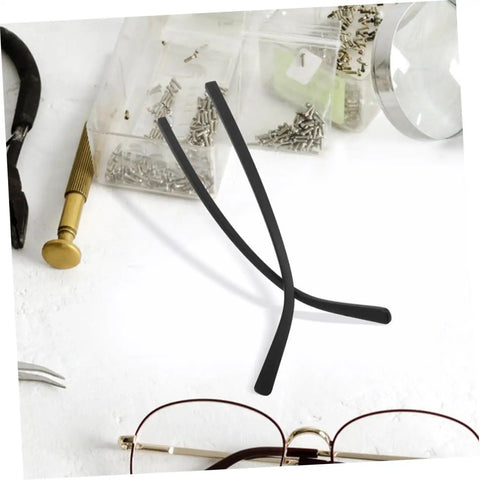 Eyewear Repair Kit With Replacement Temple Arms Screws And Lanyard For Glasses, Quick And Easy Eyeglass Frame Fix Kit on a table