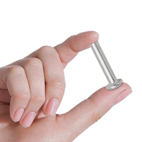 Person holding a socket screw from the Must Have Inline Skate Wheel Socket Screws Kit 30mm And 35mm Replacement Hardware For Rollerblades