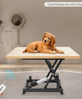 Rugged Electric Scissor Lift Table With 250 Lbs Capacity And Heavy Duty Hydraulic Pump showing a puppy resting on the adjustable platform.
