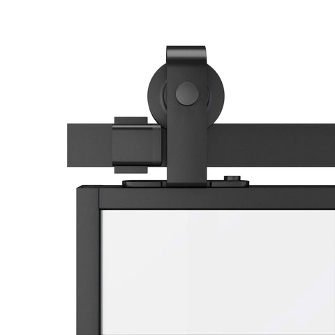Close-up of top-mounted track and wheel from 6 Ft Sliding Barn Door Hardware Kit with matte black finish for aluminum glass doors.