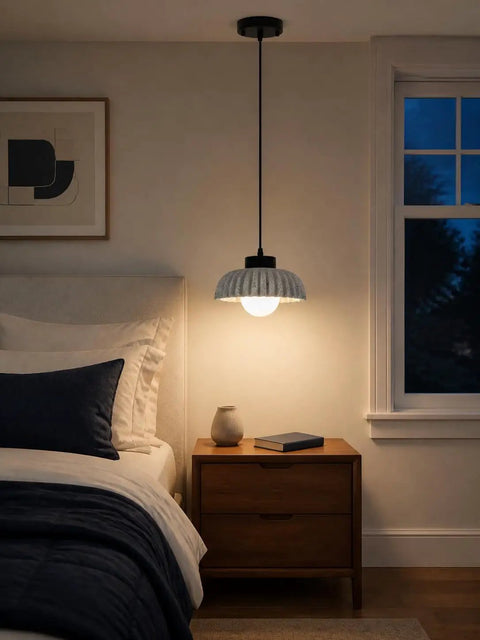 Karjera Black Pendant Lights Kitchen Island, Ribbed Concrete Hanging Light over bedside table in a cozy bedroom setting.