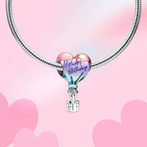Happy Birthday Hot Air Balloon Charm In 925 Sterling Silver With Enamel Heart Balloon on bracelet, pink background