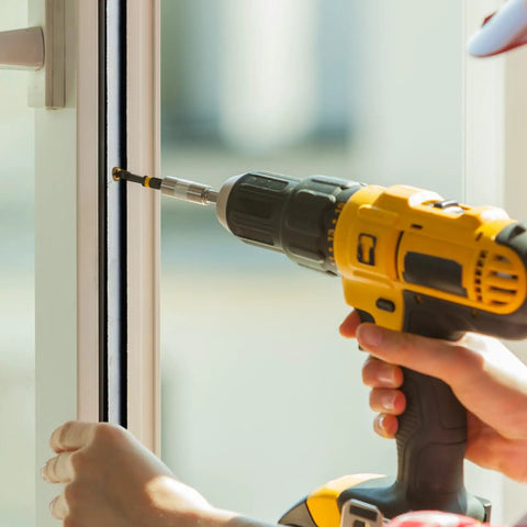 Person installing Heavy Duty Commercial Door Astragal Weatherstrip 2 Pack 42 Inch Tight Gap Seal Gasket with power drill.