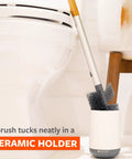 Toilet Brush With Ceramic Holder And Instant Dry Coating For Mold And Mildew Prevention beside toilet