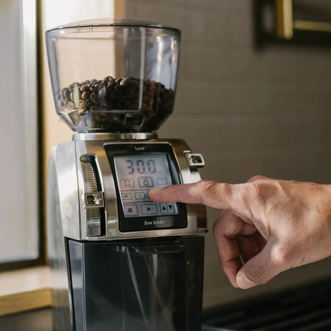 Heavy Duty Commercial Coffee Grinder Featuring Flat Steel Burrs And 260 Grind Settings For Espresso And Pour Over Brewing, control panel in use.