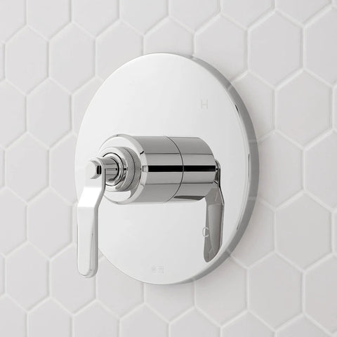 Signature Hardware Gunther 1.8 GPM Pressure Balanced Shower System chrome control handle against hexagonal tiled wall.