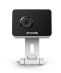 Front view of a 1080p Plug-In WiFi Indoor Security Camera with AI Motion Detection on a stand, black and silver body.