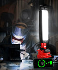 Milwaukee 18V Compatible LED Work Light 30W 2400LM with USB Port on jobsite featuring mounting hooks and cordless power in use
