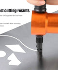 Pro Grade Double Head Sheet Metal Nibbler Drill Attachment cutting precise shapes with orange head on metal sheet