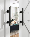 Two Pack 12 Inch Barn Door Handles Set With Rustic Two Side Pull And Flush Sliding Design in Black Square Finish on white doors.