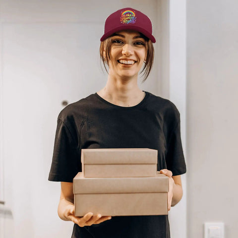 Person wearing a chestnut red Everyone Deserves This Dope Trucker Hat For Men With A Funny Inclusive Message indoors carrying boxes.
