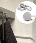 Heavy Duty Magnetic Carabiner Hooks Featuring Badass Strength Neodymium Magnets And A Smooth Swivel Hook for hanging kitchen tools.