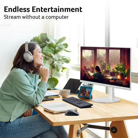 Person using 27 Inch Smart Monitor With WebOS For Streaming TV And Gaming Bluetooth Wireless Projection Screen Mirroring IoT Hub