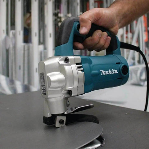 Using 10 Gauge Sheet Metal Shear With Low Noise 81 dB, 2-Inch Cut Radius on a metal sheet, shown in action.