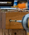 Go-To Exterior Wood Screws 4 Inch Size 10 By Bronze Deck Screw Set being drilled into wood for outdoor projects