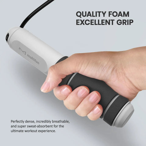 Hand holding the handle of Digital Jump Rope With Smart Counter And Timer, App Free Skipping Rope For Cardio Burn