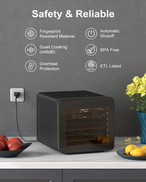Heavy Duty Food Dehydrator Machine With Seven Stainless Trays And Simple Temp Timer Tweaks Straight Up Crushes Bulk Snack Prep Gonna Keep Your Jerky Fruit Meat Herbs Fresh Year Round Tight on kitchen counter with fruit.