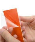 Hands peeling protective film off G10 Knife Handle Scale Sheets Set Pre Cut Spacer Material For Knife Making And DIY Projects And Tool Kits 20 Pieces In 10 Colors 6.3 Inches By 2 Inches By 0.03 Inches Pro Grade Durable Knife Scales For Folding Fixed Blade And Kitchen Knives