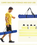 Man carrying a Four Piece Adjustable Dog Agility Jump Set Training Kit with Portable Carry Bag For All Sizes Easy Height Adjustments Park Ready Outdoor Practice Yellow