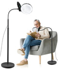 Man using Lighted Floor Magnifier With Stand Featuring 10X And 20X Lenses, 36 LED Dimmable Gooseneck Reading Lamp for reading