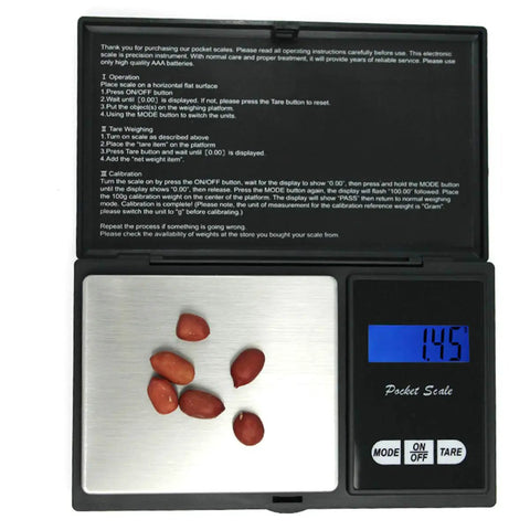 Mini Stainless Steel Digital Pocket Scale 0.01g To 500g With Tare Function displaying 1.45g with seeds on platform