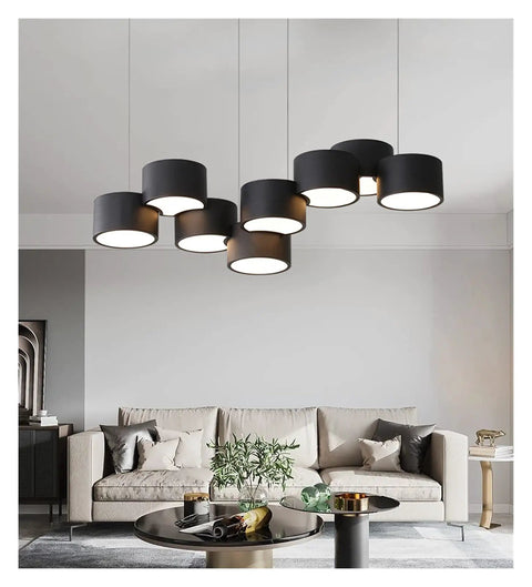 Sleek Modern Led Pendant Light For Kitchen And Dining Room With Dope Iron Frame And Killer Warm Glow Smooth Acrylic Shades Dimmable Switch For Chill Home Vibes, featuring multiple black shades, in a stylish living room.