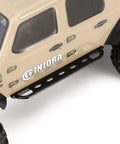 Close-up of black metal side pedal rock slider on 1/24 RC crawler, Axial SCX24 Gladiator, heavy duty armor with scale detailing.