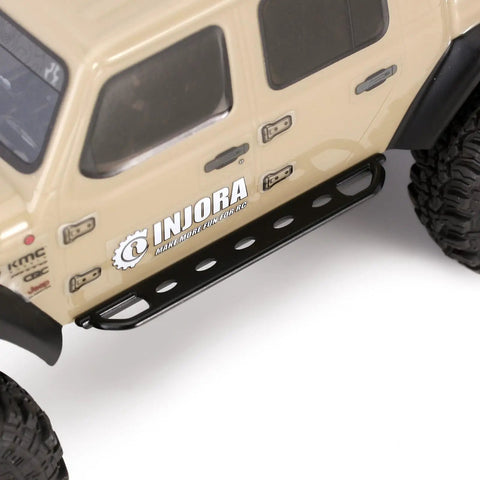 Close-up of black metal side pedal rock slider on 1/24 RC crawler, Axial SCX24 Gladiator, heavy duty armor with scale detailing.