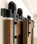Black Top Mounted Wood Sliding Barn Door Hardware Kit For Double Doors Bypass Closet Track System with Heavy Duty Rollers installed