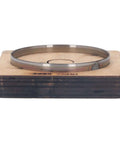 75mm round leather cutting die on wooden base, precision hollow punch cutter for DIY crafts, durable alloy steel construction
