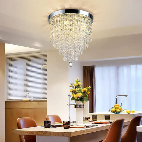 Living room view with Three Light Crystal Chandelier Mini Flush Mount Ceiling Light Modern Pendant for Bedroom Hallway Bar, 12.2 Inch Height by 9.8 Inch Wide, G9 LED Bulbs Not Included, Cozy Warm Glow hanging above dining area.