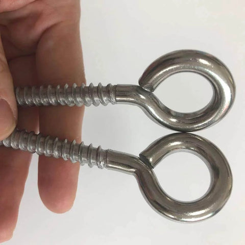 Close-up of two M8 heavy duty swing hooks eye screws, 4 Pack M8 Heavy Duty Swing Hooks Eye Screws 1200Lb Capacity Hammock Hanging Kit, stainless steel.