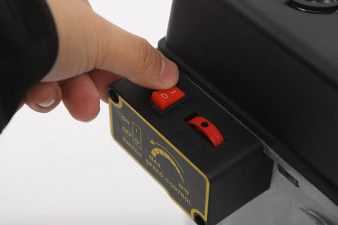 Hand adjusting the variable speed control on the High Precision Mini Benchtop Drill Press, 340W Electric Portable Drilling Machine.