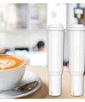 Premium Coffee Machine Water Filter Softens Hard Tap Water Acts As A Game Changer For Clean Brew Texture And Smooth Real Deal Flavor In Home Espresso Drip Makers Cartridge Pair Next to Coffee Cup.