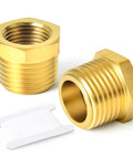 Two brass reducer bushings with hex shapes, 1-in NPT male to 3/4-in NPT female, threaded pipe fittings.