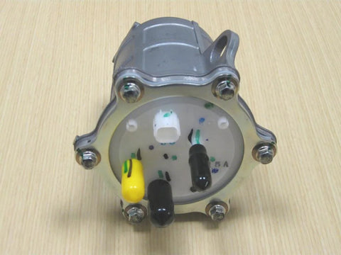 Close-up of TRX 420 Rancher ATV Fuel Pump Assembly OEM Replacement For 2007 Through 2013 Models on wooden surface