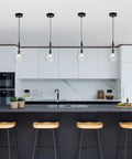 Cozy Farmhouse Seeded Glass Pendant Light With Wooden Teardrop Socket above modern kitchen island