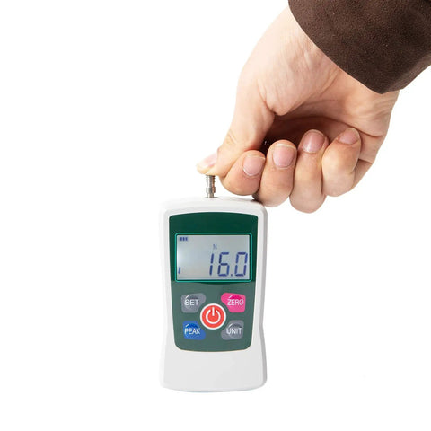 Hand holding Digital Force Gauge 500N with four units N Lb Kg Oz, three modes, 0.1N 0.01kg 0.1lb 1oz resolution, portable use.