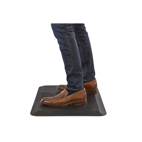 Person standing on Anti Fatigue Standing Mat 20 By 30 Inches For Home And Office Durable Self Skinning Polyurethane Reduces Fatigue