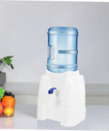 Portable Outdoor Water Dispenser Stand For Camping And Picnics on kitchen countertop, blue and white, compact and lightweight
