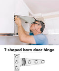 Heavy Hitter T Shaped Barn Door Hardware Stainless Steel Pivot Hinge installed by a man on interior wooden gate.