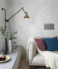 Top Tier 15 Amp Decorator Wall Outlet With Included Wall Plate And Efficient USB Type C Charging mounted on a modern living room wall.