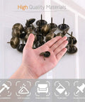 Premium Antique Bronze Upholstery Tacks 200 Piece Assortment Kit displayed in a hand, showcasing antique finish and durability.