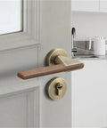 Silent Zinc Alloy Door Lock With Wood Grain Handle for Bedroom Security on white door in modern kitchen setting