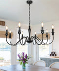 Interior view with Black Farmhouse Chandelier With 8 Candle Style Lights, Rustic Metal Ceiling Fixture in a bright dining room.