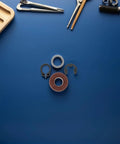 Bread Maker Pan Seal Kit Replacement Parts With Stainless Steel Flat Washer And Spring Steel E Clip For Bread Maker Machine, Easy Maintenance And Leak Prevention For Home Bakers And Small Bakery Setups, seal kit parts on blue background