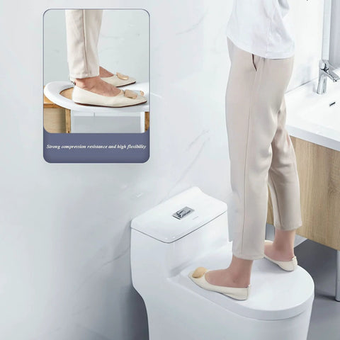 Person standing on Elongated Toilet Seat With Quiet Close, Grip Tight Bumpers, Easy To Install And Clean, White Comfort Seat For Heavy Duty Use, Strong Bearing Capacity, Anti Slip, Durable Construction For Quiet Nighttime Use.