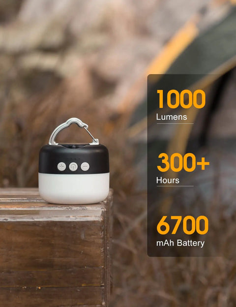 Rechargeable Camping Lantern 1000 Lumen LED Light With 6700mAh Power Bank shown outdoors on wooden table