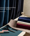 Sky Blue Velvet Curtains 72 Inch Long With Grommets, fabric samples, tape measure, and scissors on a table